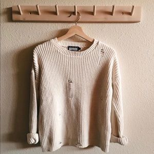 Distressed knit white sweater